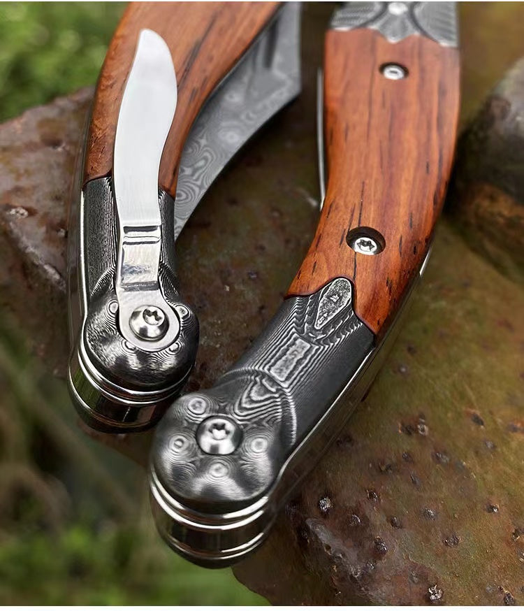 Discover the Versatility of the Damascus Steel Folding Outdoor Utility Tool
